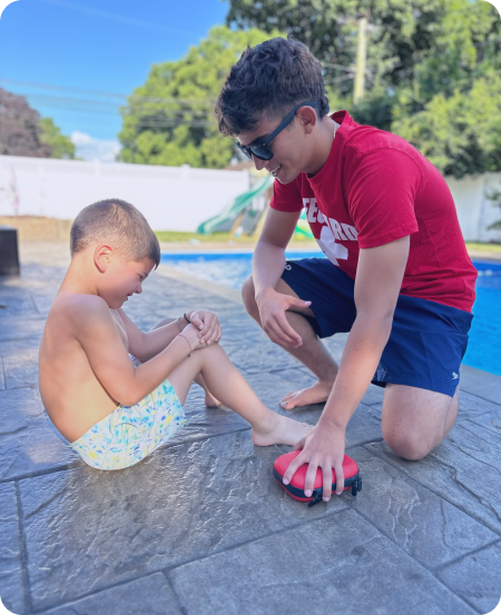 two boys by the pool