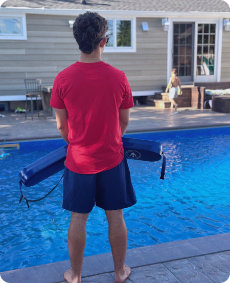 a boy watches the pool